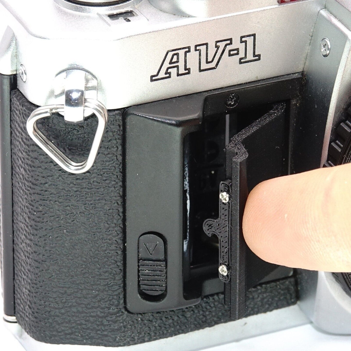 Battery compartment cover replacement for Canon AV-1
