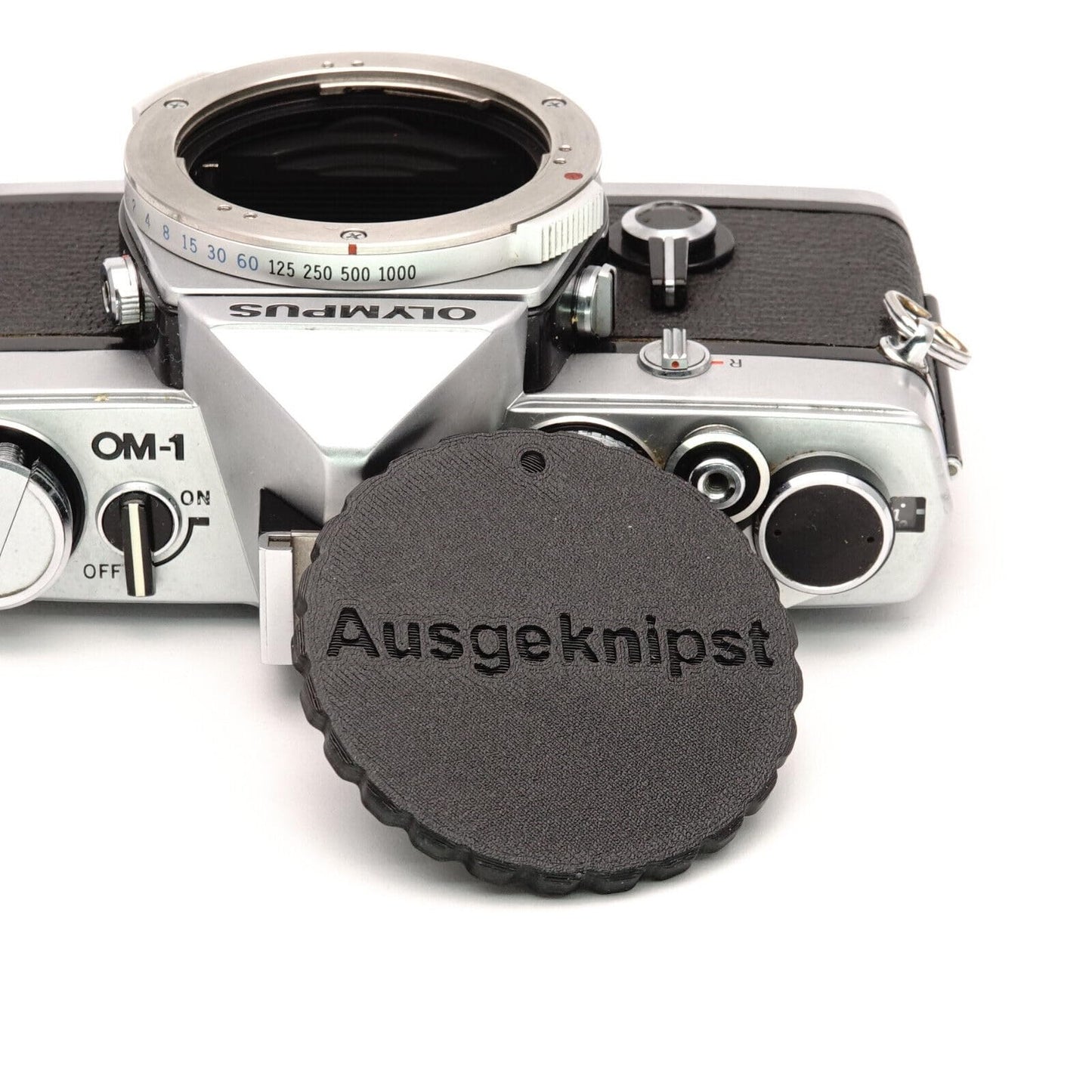 Body cap for Olympus OM cameras (OM-1, OM-2, OM-4, OM-10)